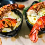 cooked shrimp on black ceramic bowl