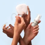 a group of people holding a white object in their hands