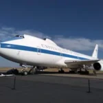 white and blue airliner