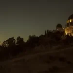gray and yellow dome observatory at night