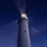 white light tower under blue sky during night time
