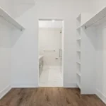 white wooden door on brown wooden parquet floor