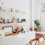 white wooden shelf and decors