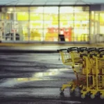 yellow shopping carts on concrete ground