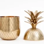 gold-colored pineapple container