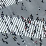 aerial view of people crossing on road