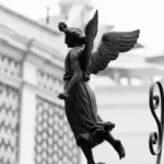 shallow focus photo of angel statue