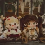 a group of dolls sitting next to each other