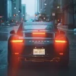 gray Porsche car on road