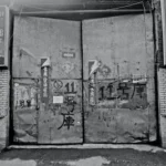 grayscale photography of Kapto 11 door