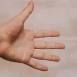 person showing left hand