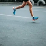 pair of blue-and-white Adidas running shoes