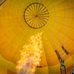 low angle photography of yellow hot air balloon
