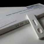 white pregnancy test kit showing negative result