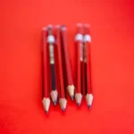 white and red coloring pencils