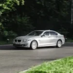 gray mercedes benz sedan on road during daytime